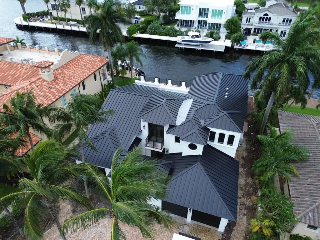 Completed dark standing seam architectural metal roof restoration reflecting 5-star customer craftsmanship