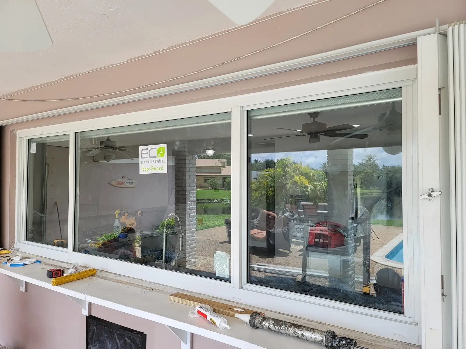 Hurricane impact window and multi-slide patio door installation